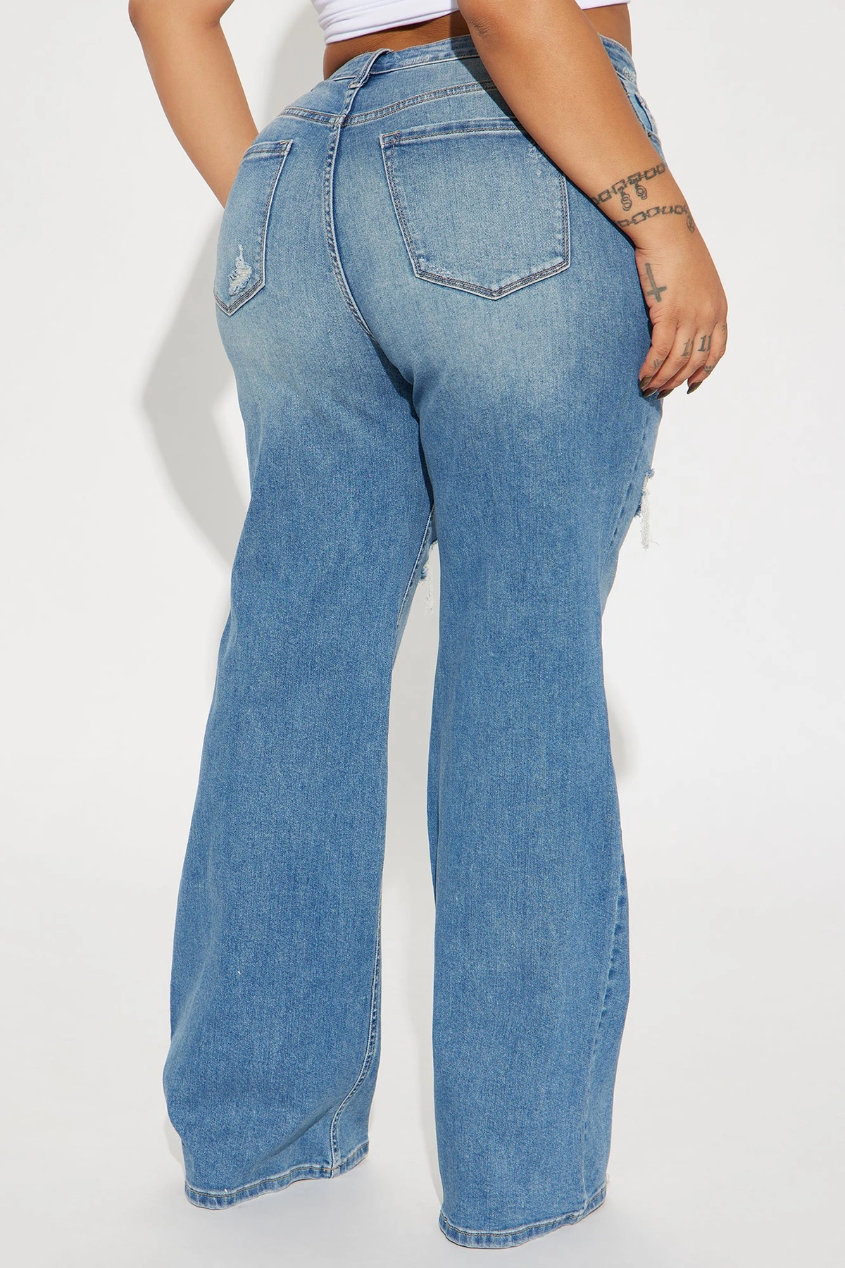 Remi Ripped Stretch Baggy Jeans - Medium Wash — Ganga de lavagem média